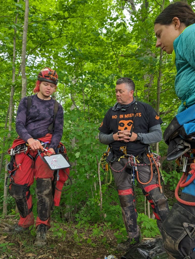 Cave rescue training briefing in the field